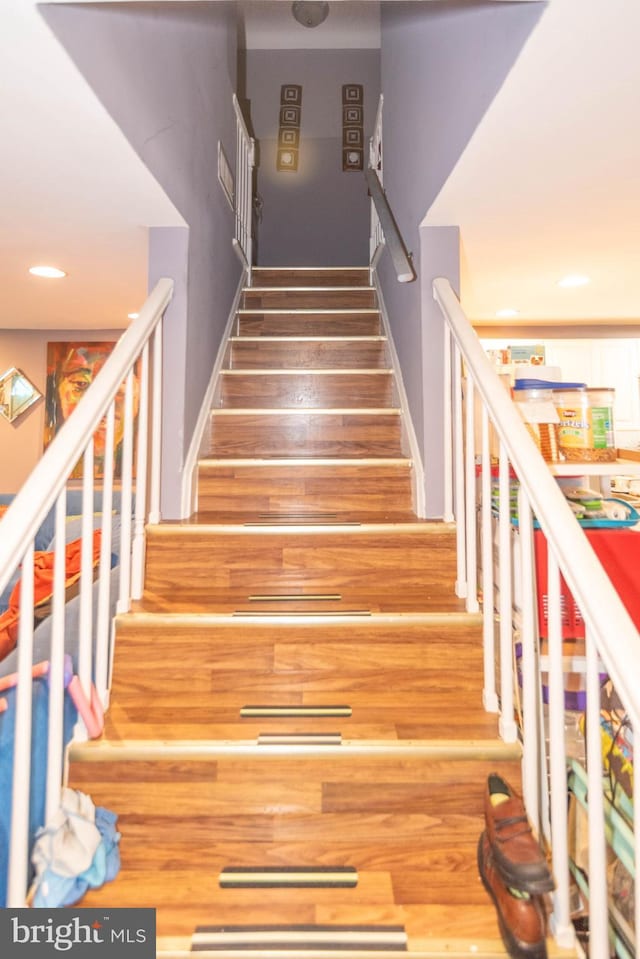 4306 Greenhill Ave, Baltimore, MD 21206 - stairway with wood finished floors and recessed lighting