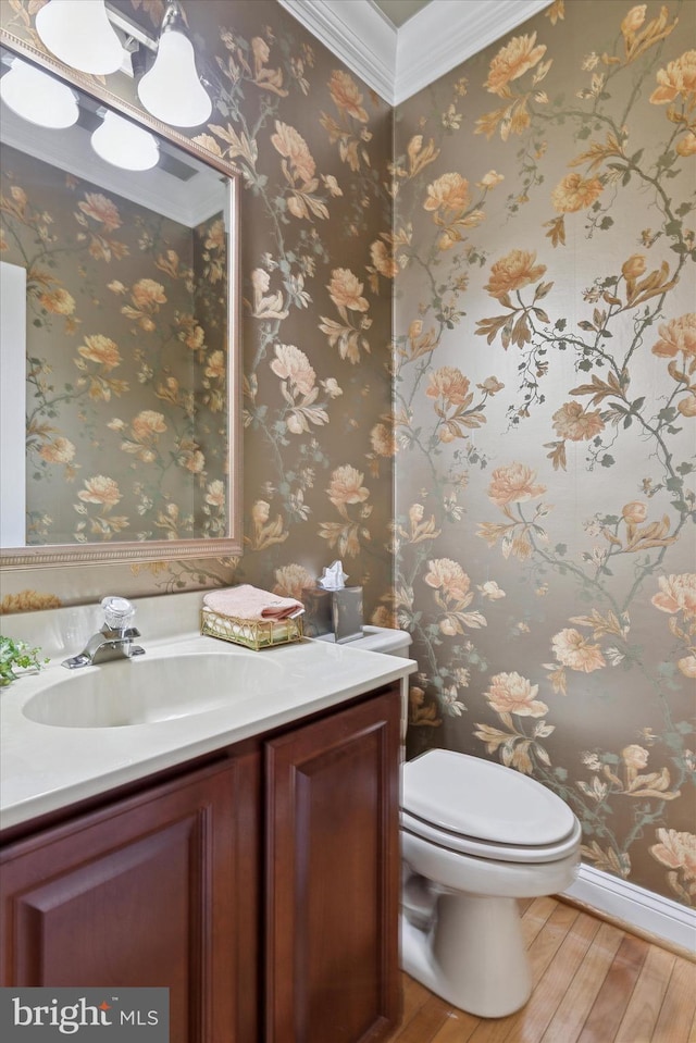 130 Piqua Cir Unit 30, Berwyn, PA 19312 - half bathroom with vanity, wood finished floors, wallpapered walls, and ornamental molding