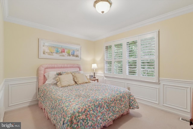 130 Piqua Cir Unit 30, Berwyn, PA 19312 - bedroom with crown molding, light carpet, a decorative wall, and a wainscoted wall