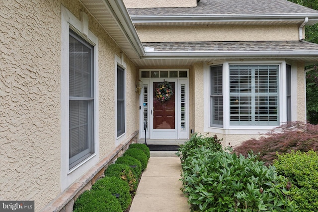130 Piqua Cir Unit 30, Berwyn, PA 19312 - doorway to property with stucco siding and roof with shingles