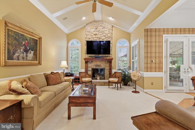 130 Piqua Cir Unit 30, Berwyn, PA 19312 - living area featuring a stone fireplace, ceiling fan, and carpet floors