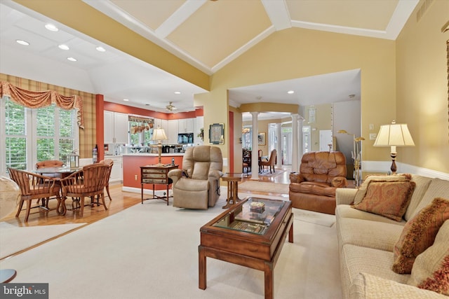 130 Piqua Cir Unit 30, Berwyn, PA 19312 - living room featuring ornate columns, vaulted ceiling, light wood finished floors, and recessed lighting