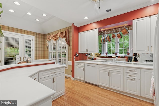 130 Piqua Cir Unit 30, Berwyn, PA 19312 - kitchen featuring white dishwasher, light wood-type flooring, recessed lighting, light countertops, and white cabinetry