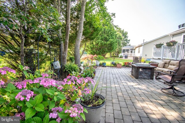 37126 Solitude Dr, Selbyville, DE 19975 - view of patio with an outdoor fire pit