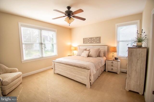 37126 Solitude Dr, Selbyville, DE 19975 - bedroom featuring light colored carpet and ceiling fan
