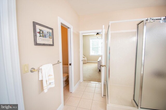 37126 Solitude Dr, Selbyville, DE 19975 - bathroom featuring a stall shower, tile patterned floors, and ensuite bath