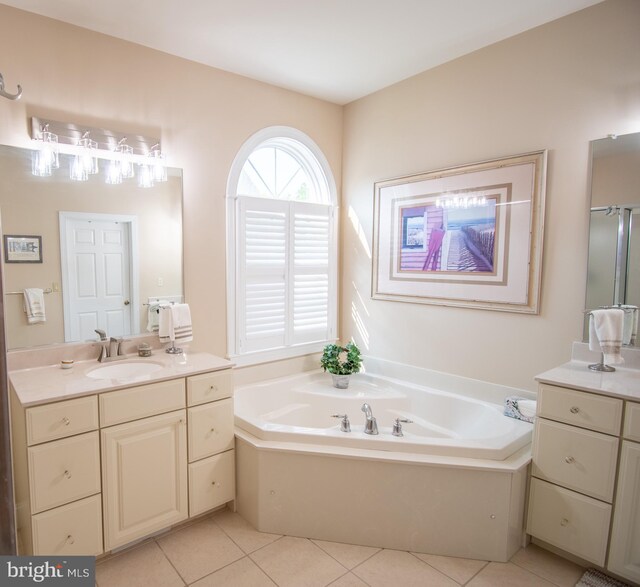 37126 Solitude Dr, Selbyville, DE 19975 - bathroom with vanity, a bath, and tile patterned flooring