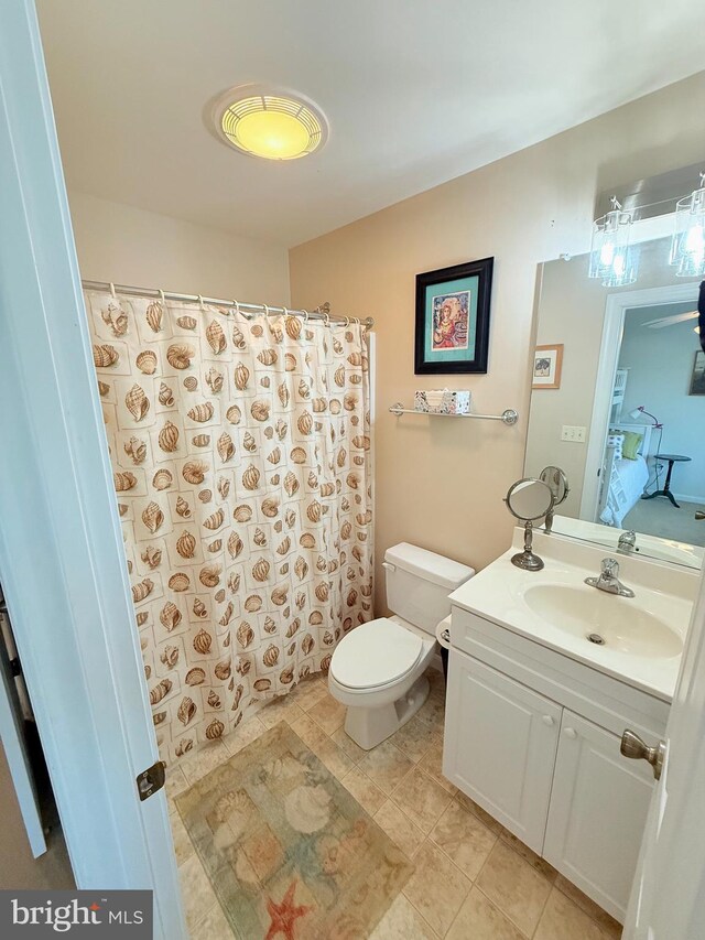 37126 Solitude Dr, Selbyville, DE 19975 - full bathroom with vanity, tile patterned flooring, and a shower with curtain