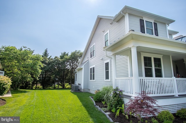 37126 Solitude Dr, Selbyville, DE 19975 - view of side of home featuring a porch and a lawn
