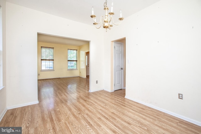 23 Navesink Dr, Pennington, NJ 08534 - spare room with a chandelier and light wood-type flooring