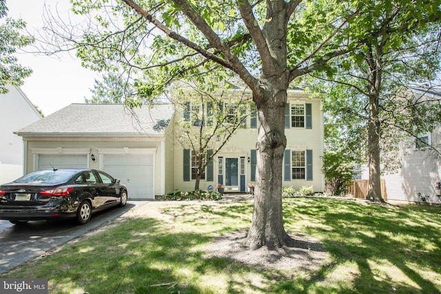 23 Navesink Dr, Pennington, NJ 08534 - colonial inspired home with an attached garage, a front lawn, and asphalt driveway