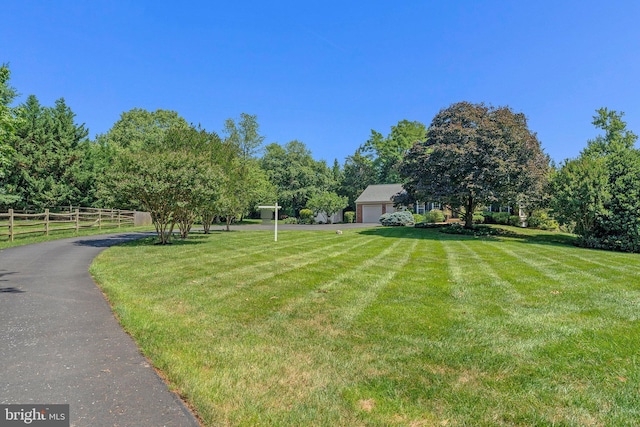 2707 E Ridge Ct, Oakton, VA 22124 - view of yard with an attached garage