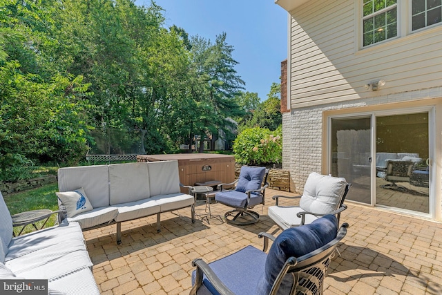 2707 E Ridge Ct, Oakton, VA 22124 - view of patio / terrace with outdoor lounge area and a hot tub
