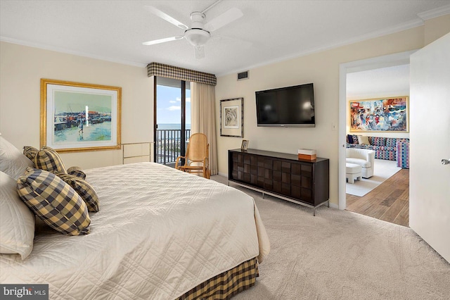 403 N Edgewater House Rd Unit 403N, Bethany Beach, DE 19930 - carpeted bedroom featuring ornamental molding, access to exterior, and ceiling fan
