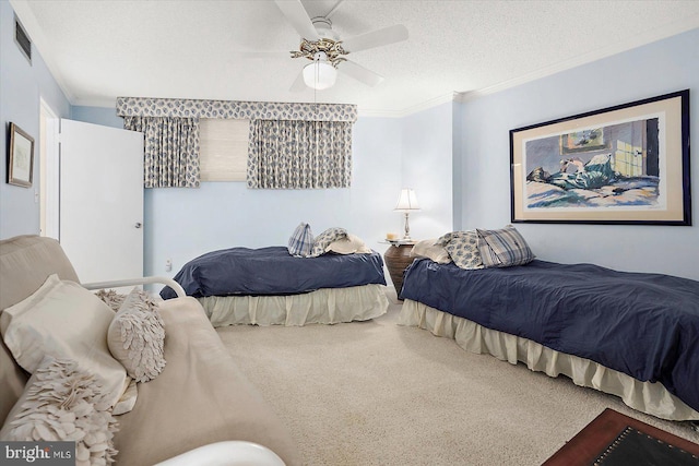 403 N Edgewater House Rd Unit 403N, Bethany Beach, DE 19930 - bedroom featuring carpet flooring, a textured ceiling, crown molding, and ceiling fan