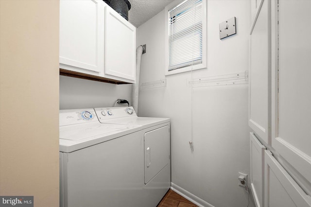 403 N Edgewater House Rd Unit 403N, Bethany Beach, DE 19930 - washroom featuring cabinet space, independent washer and dryer, and dark wood-style flooring