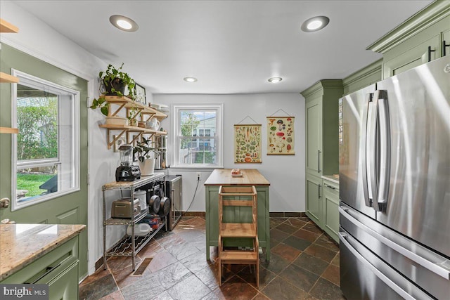 809 Addingham Ave, Drexel Hill, PA 19026 - kitchen featuring green cabinets, freestanding refrigerator, stone tile floors, recessed lighting, and open shelves