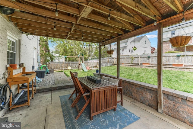809 Addingham Ave, Drexel Hill, PA 19026 - fenced backyard with a patio area, a playground, and outdoor dining area