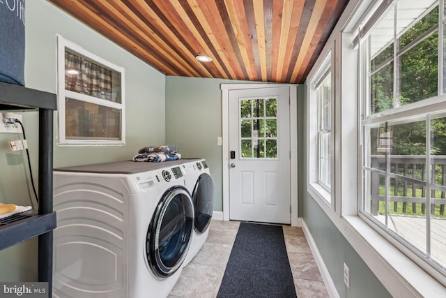 1707 Peach St, Upper Chichester, PA 19061 - laundry room featuring separate washer and dryer, wood ceiling, and light tile patterned floors