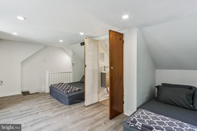 1707 Peach St, Upper Chichester, PA 19061 - bedroom featuring wood finished floors, vaulted ceiling, and recessed lighting