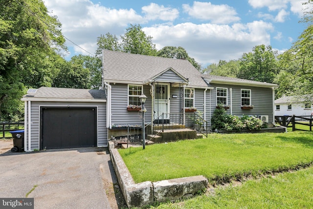 1707 Peach St, Upper Chichester, PA 19061 - view of front of house with asphalt driveway, an attached garage, and roof with shingles