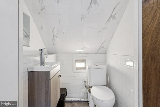 1707 Peach St, Upper Chichester, PA 19061 - half bathroom with vanity and tile walls