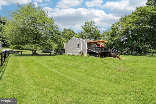 1707 Peach St, Upper Chichester, PA 19061 - view of yard with a wooden deck, stairway, and view of scattered trees