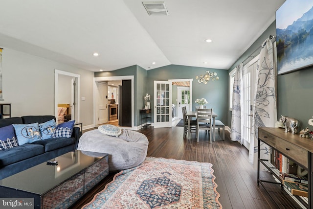 1707 Peach St, Upper Chichester, PA 19061 - living area with lofted ceiling, french doors, dark wood-style floors, and recessed lighting