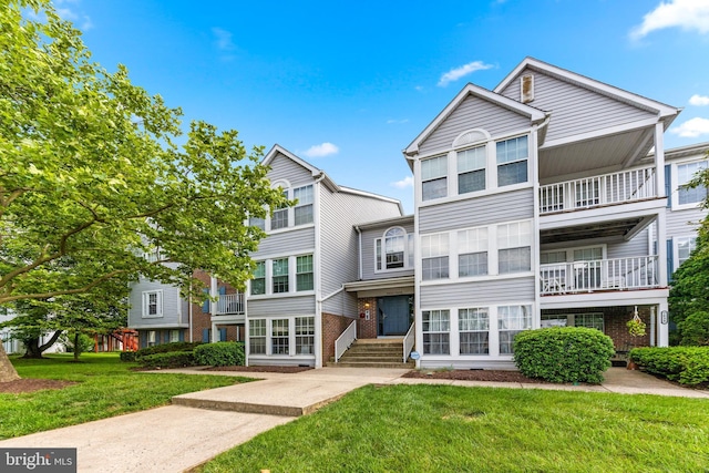 7854 Cornerstone Way Unit 8-7854, Windsor Mill, MD 21244 - view of property featuring a front yard and brick siding