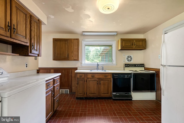 214 Sugartown Rd, Devon, PA 19333 - kitchen with dishwasher, electric range oven, freestanding refrigerator, stove, and brick patterned flooring