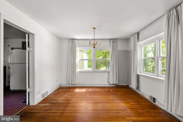 214 Sugartown Rd, Devon, PA 19333 - unfurnished room featuring healthy amount of natural light and a chandelier