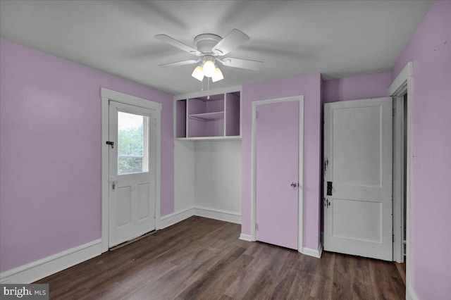 210 N Waverly St, Reading, PA 19607 - unfurnished bedroom with dark wood-style flooring, a ceiling fan, and a closet