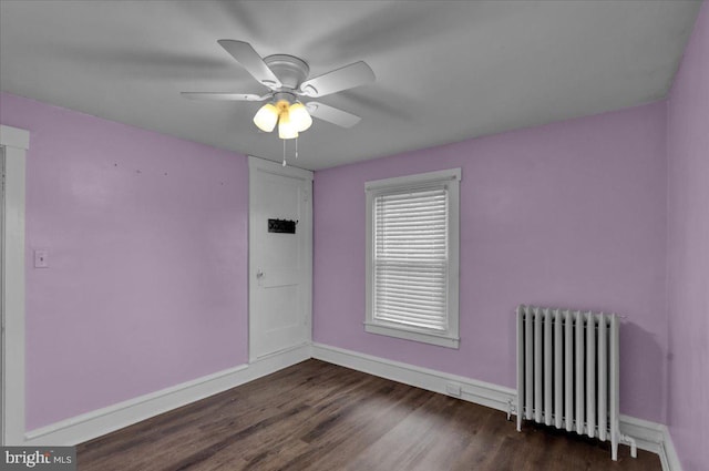 210 N Waverly St, Reading, PA 19607 - empty room with radiator, a ceiling fan, and dark wood-style flooring