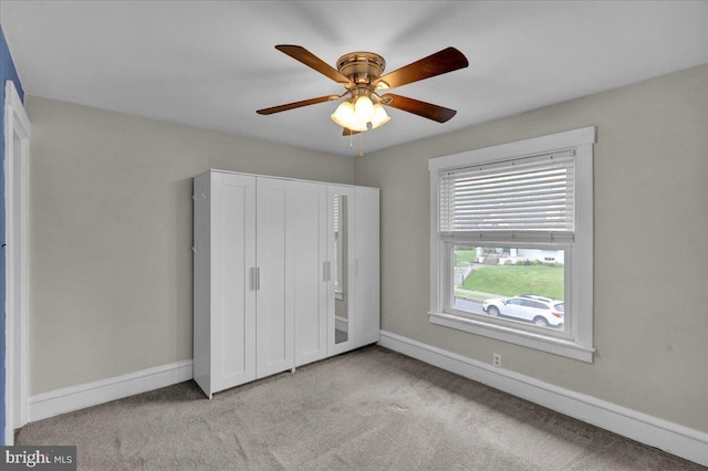210 N Waverly St, Reading, PA 19607 - unfurnished bedroom featuring carpet, a ceiling fan, and a closet