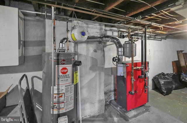 210 N Waverly St, Reading, PA 19607 - utility room with gas water heater and a heating unit