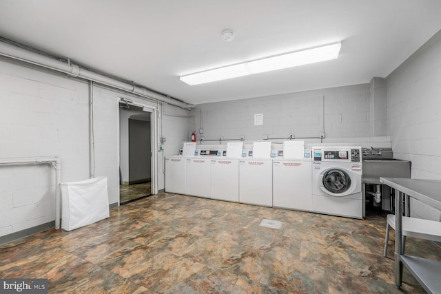 2829 Connecticut Ave NW Unit 706, Washington, DC 20008 - communal laundry room with washer and dryer and concrete block wall
