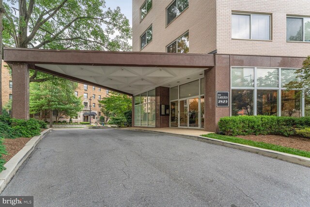 2829 Connecticut Ave NW Unit 706, Washington, DC 20008 - view of building exterior with a carport