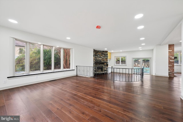 4127 Presidential Dr, Lafayette Hill, PA 19444 - unfurnished living room with a stone fireplace, wood-type flooring, and recessed lighting