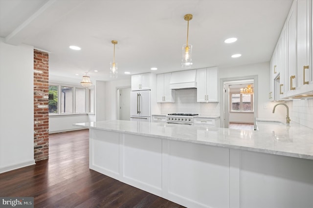 4127 Presidential Dr, Lafayette Hill, PA 19444 - kitchen with high end fridge, custom range hood, range, backsplash, and dark wood finished floors