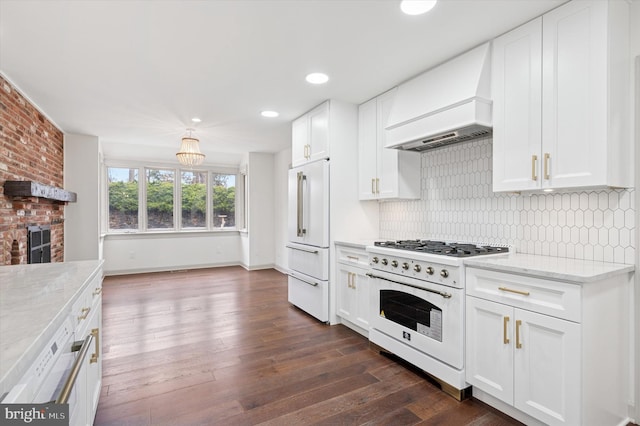4127 Presidential Dr, Lafayette Hill, PA 19444 - kitchen featuring custom exhaust hood, high end appliances, dark wood-type flooring, backsplash, and white cabinetry