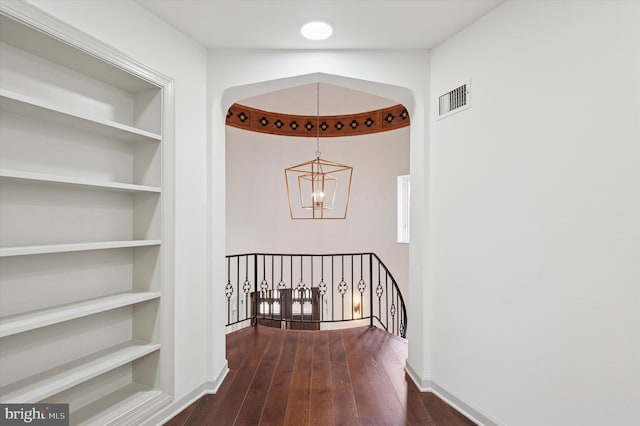 4127 Presidential Dr, Lafayette Hill, PA 19444 - corridor with a chandelier, an upstairs landing, dark wood-type flooring, and built in shelves