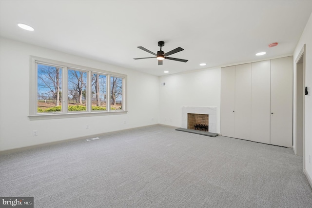 4127 Presidential Dr, Lafayette Hill, PA 19444 - unfurnished living room with a fireplace with raised hearth, ceiling fan, recessed lighting, and carpet flooring
