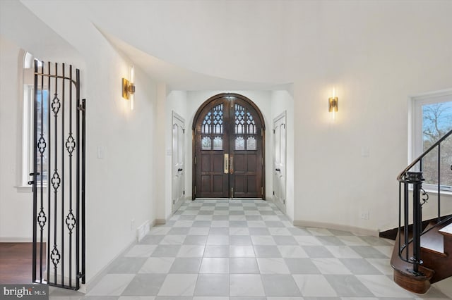 4127 Presidential Dr, Lafayette Hill, PA 19444 - foyer entrance with arched walkways and stairs