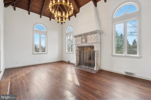 4127 Presidential Dr, Lafayette Hill, PA 19444 - unfurnished living room featuring a wood ceiling with exposed beams, a chandelier, a large fireplace, high vaulted ceiling, and wood-type flooring