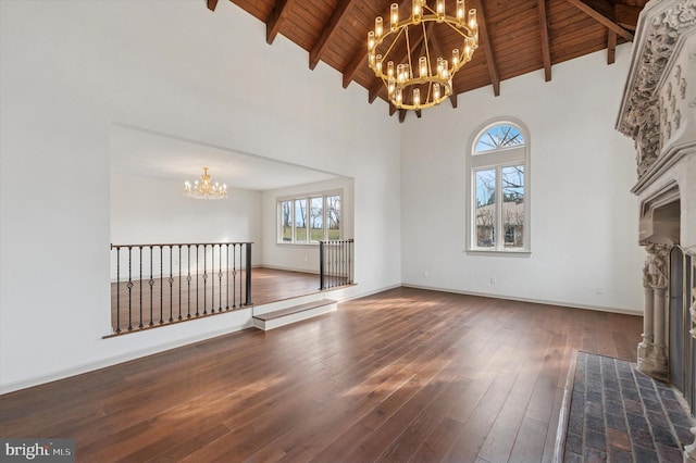 4127 Presidential Dr, Lafayette Hill, PA 19444 - unfurnished living room featuring a chandelier, a wood ceiling with exposed beams, high vaulted ceiling, wood-type flooring, and a fireplace