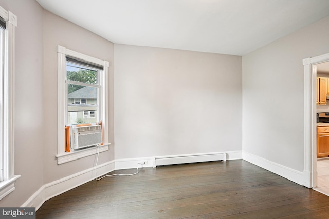 134 S Main St, Glassboro, NJ 08028 - spare room featuring hardwood / wood-style flooring, baseboard heating, and cooling unit