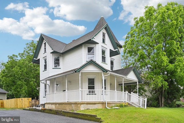 134 S Main St, Glassboro, NJ 08028 - victorian house with covered porch and a shingled roof