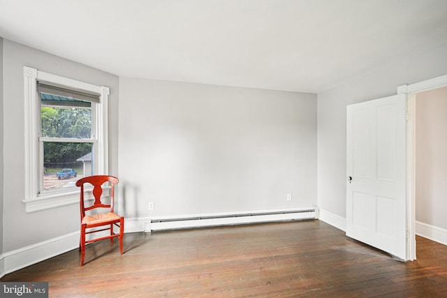 134 S Main St, Glassboro, NJ 08028 - unfurnished room featuring hardwood / wood-style flooring and a baseboard heating unit