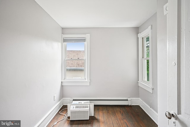 134 S Main St, Glassboro, NJ 08028 - empty room with wood finished floors and a wall mounted AC