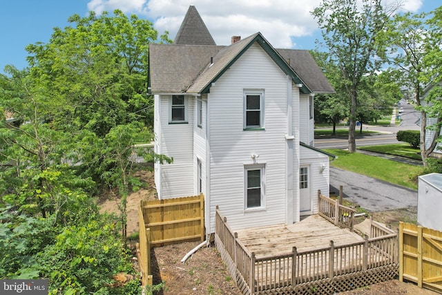 134 S Main St, Glassboro, NJ 08028 - rear view of house featuring roof with shingles and a deck